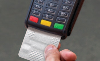 Person Using a Card Reader Cleaning Card