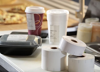 Iconex labels on cups & food packaging