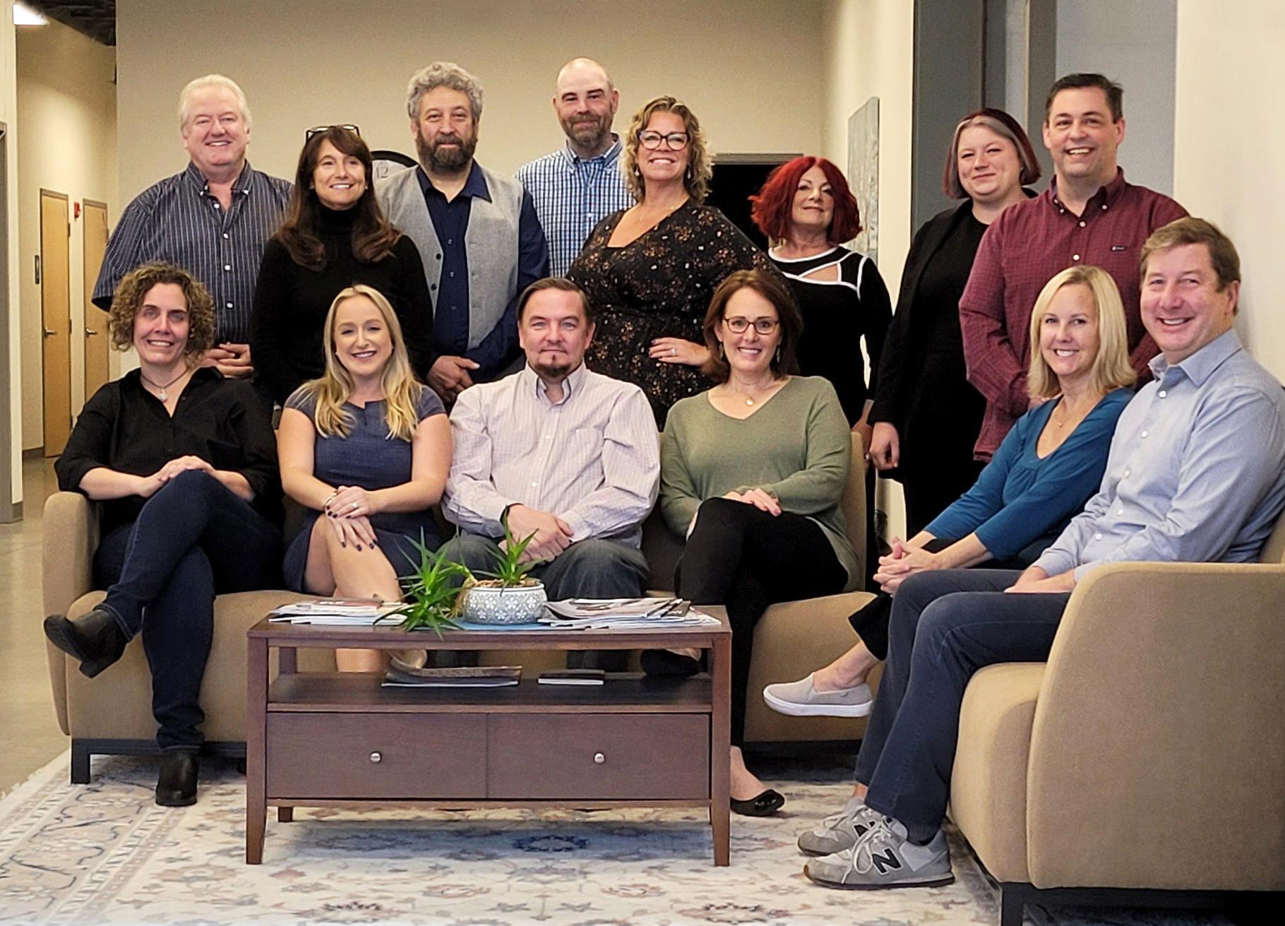 POS Supply Solutions Team Gathered Around For A Group Photo