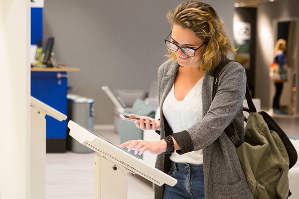 Student uses self-service kiosks