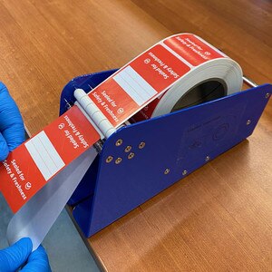 Adjustable Label Dispenser with 3-disks